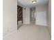 Bedroom showcasing geometric accent wall, neutral carpet, closet, and soft, natural light at 2411 W Horatio St # 537, Tampa, FL 33609