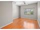 Well-lit bedroom with hardwood floors and a large window at 2411 W Horatio St # 537, Tampa, FL 33609