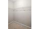 Walk-in closet with ample storage space and wire shelving for organization at 2411 W Horatio St # 537, Tampa, FL 33609