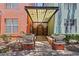 Building entrance featuring brick pathway, stone planters, and a covered entryway at 2411 W Horatio St # 537, Tampa, FL 33609