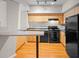 Functional kitchen with modern appliances and hardwood floors at 2411 W Horatio St # 537, Tampa, FL 33609