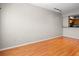 Living room featuring hardwood floors and modern track lighting at 2411 W Horatio St # 537, Tampa, FL 33609