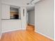 Living room with hardwood floors and view of kitchen at 2411 W Horatio St # 537, Tampa, FL 33609
