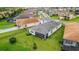 Aerial view showcases the home's location, large backyard, and the surrounding community at 32740 Tree Of Life Ave, Wesley Chapel, FL 33543
