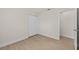 Empty bedroom features a double door closet, vinyl floors and white trim at 4604 Hunts Ave, Plant City, FL 33566