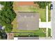 Birds-eye view of the roofline showcasing a well-maintained property and surrounding yard at 212 Citrus Landing Dr, Plant City, FL 33563