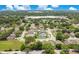 Expansive aerial view of the neighborhood showcasing manicured lawns and community at 212 Citrus Landing Dr, Plant City, FL 33563