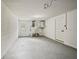 Cleaned basement space with painted walls, a door to the backyard, and ample room for storage or projects at 4119 Beacon Square Dr, Holiday, FL 34691