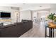 Open-concept living room with views of the kitchen and dining areas, seamlessly connected for easy living at 4601 Copper Ln, Plant City, FL 33566