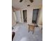 Spacious bedroom featuring neutral walls, ceiling fan, and multiple doorways ready for renovation at 3607 Johnson Ct, Palm Harbor, FL 34684