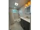 Bathroom with modern finishes, shower, and vanity mirror at 9153 86Th Ave, Seminole, FL 33777