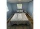 Bedroom with wood floors and natural lighting at 9153 86Th Ave, Seminole, FL 33777