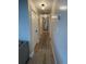 Hallway featuring wood flooring and a decorative area rug at 9153 86Th Ave, Seminole, FL 33777