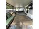 Inviting screened patio features an outdoor seating area and dining table at 9153 86Th Ave, Seminole, FL 33777