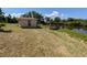 A waterfront property features a small building with a dock area and access to the canal at 155 Summerset Dr, Punta Gorda, FL 33982