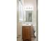 Simple bathroom with single vanity, mirror, and toilet at 4111 13Th S Ave, St Petersburg, FL 33711