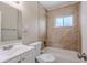 A cozy bathroom featuring a tub, shower, and light-colored tiled walls for a clean look at 4111 13Th S Ave, St Petersburg, FL 33711