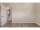 A bedroom featuring an ensuite bathroom and neutral paint to brighten the space at 4111 13Th S Ave, St Petersburg, FL 33711