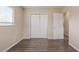 Bedroom featuring a closet and neutral decor illuminated by a window and neutral walls at 4111 13Th S Ave, St Petersburg, FL 33711