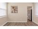 Bright dining room features a pass through to the kitchen and stainless steel refrigerator at 4111 13Th S Ave, St Petersburg, FL 33711