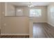 Open-concept living space with granite countertop and natural light from the window at 4111 13Th S Ave, St Petersburg, FL 33711
