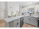 Modern kitchen with white cabinetry, stainless steel appliances, and breakfast bar at 5629 36Th N Ave, St Petersburg, FL 33710