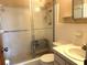 Bathroom with a tiled shower/tub and sink at 129 104Th Ave # 205, Treasure Island, FL 33706