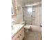 Bathroom with a tiled shower/tub and sink at 129 104Th Ave # 205, Treasure Island, FL 33706
