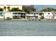 A waterfront view of several condos at 129 104Th Ave # 205, Treasure Island, FL 33706