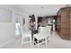 Kitchen featuring a breakfast nook with a view of the backyard and modern appliances at 2115 Valrico Heights Blvd, Valrico, FL 33594