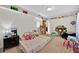 Bright bedroom features playful decor, carpet flooring and ample built in shelving for storage at 2900 Hammock Dr, Plant City, FL 33566