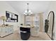 Stylish dining room with modern chandelier and elegant decor at 2900 Hammock Dr, Plant City, FL 33566