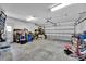 Spacious garage with ample storage space and a functional garage door at 2900 Hammock Dr, Plant City, FL 33566