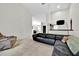 Open living area with tile floors, comfortable seating, and natural light at 2900 Hammock Dr, Plant City, FL 33566
