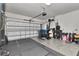 Spacious garage gym with a variety of exercise equipment and durable flooring at 8410 Red Spruce Ave, Riverview, FL 33578