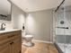 Updated bathroom with a modern glass-enclosed shower, sleek vanity, and contemporary finishes at 5141 Oakland Hills Ave, Sarasota, FL 34234
