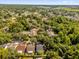An aerial view highlights the neighborhood's lush landscaping at 7511 Savannah Ln, Tampa, FL 33637