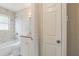 Elegant bathroom featuring marble-like tile, granite countertop, and modern vanity at 3944 11Th S Ave, St Petersburg, FL 33711