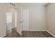 Spacious bedroom features wood-look floors and natural light from a window at 3944 11Th S Ave, St Petersburg, FL 33711