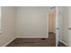 Bright bedroom featuring wood-look floors with easy access to the bathroom at 3944 11Th S Ave, St Petersburg, FL 33711