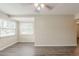 Neutral living room featuring gray tone flooring and large windows at 3944 11Th S Ave, St Petersburg, FL 33711