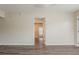 Open living room featuring gray tone flooring, and a view to other rooms at 3944 11Th S Ave, St Petersburg, FL 33711