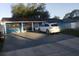 Charming single-story home with a well-maintained lawn and a private driveway at 6718 Runningwoods Dr, Tampa, FL 33634