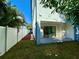 Private backyard featuring a patio, a white fence, and an area lined with decorative mulch at 2309 S Ardson Pl # 1, Tampa, FL 33629