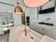Bright kitchen with stainless steel appliances, a large island, and a walk in pantry at 2309 S Ardson Pl # 1, Tampa, FL 33629