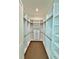 Spacious walk-in closet with custom shelving and drawers for organized storage at 2309 S Ardson Pl # 1, Tampa, FL 33629