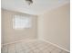Bedroom with tile floors and a window offering plenty of light at 6940 82Nd N Ave, Pinellas Park, FL 33781