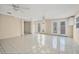 Spacious open living space with tile flooring and backyard access at 6940 82Nd N Ave, Pinellas Park, FL 33781