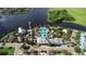 Gorgeous aerial view of community with clubhouse, pool, docks, and lakes surrounded by lush landscaping at 1031 Signet, Apollo Beach, FL 33572