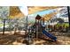 Community playground with multiple slides and shade sails for sunny days at 1031 Signet, Apollo Beach, FL 33572